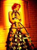 Redhead Justine Joli In Amazing Dress Made Of Leather Belts Poses In The Empty Room