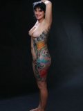 Completely Naked Brunette Mom Michelle Aston Exposes Her Color Tattoo In The Dark